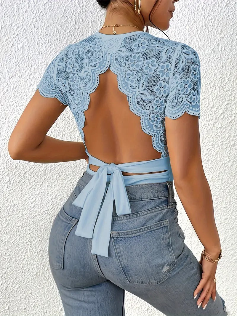 Randig jumpsuit med stickad bar rygg