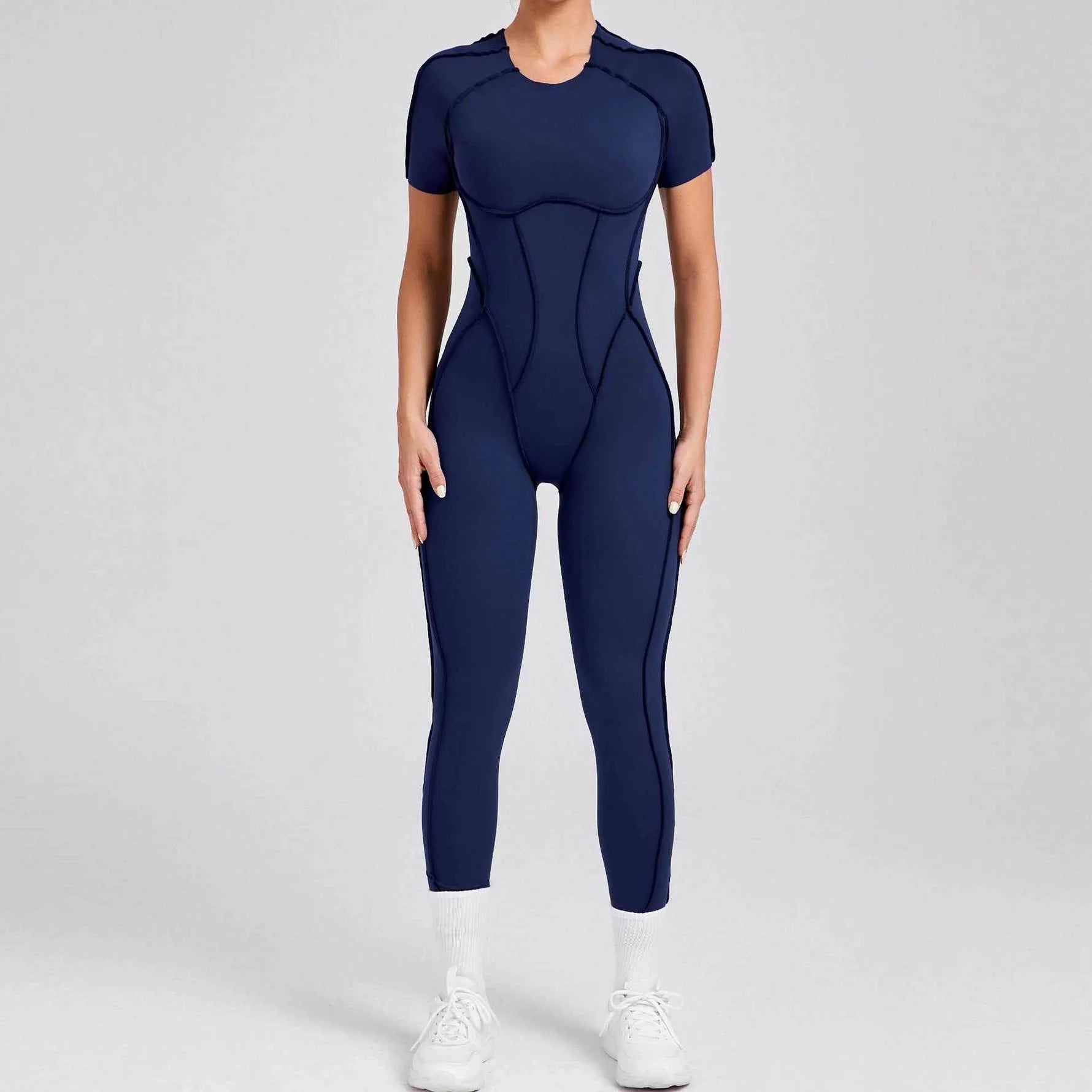 Kortärmade rygglösa sport jumpsuits