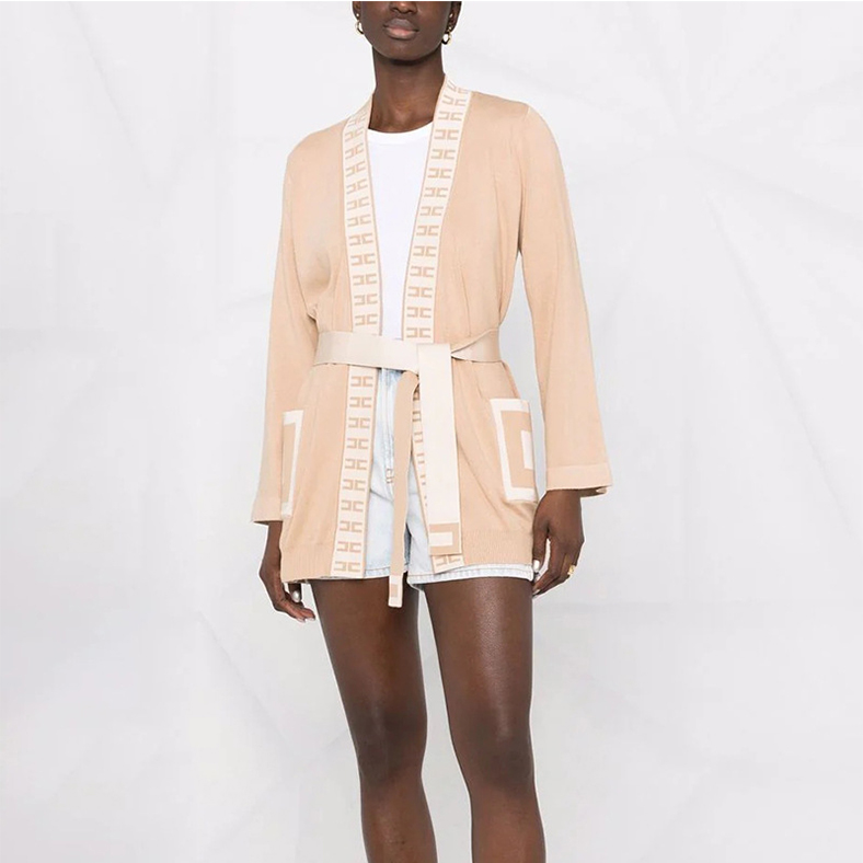 Badrock med bälte i midjan stickad drees coat