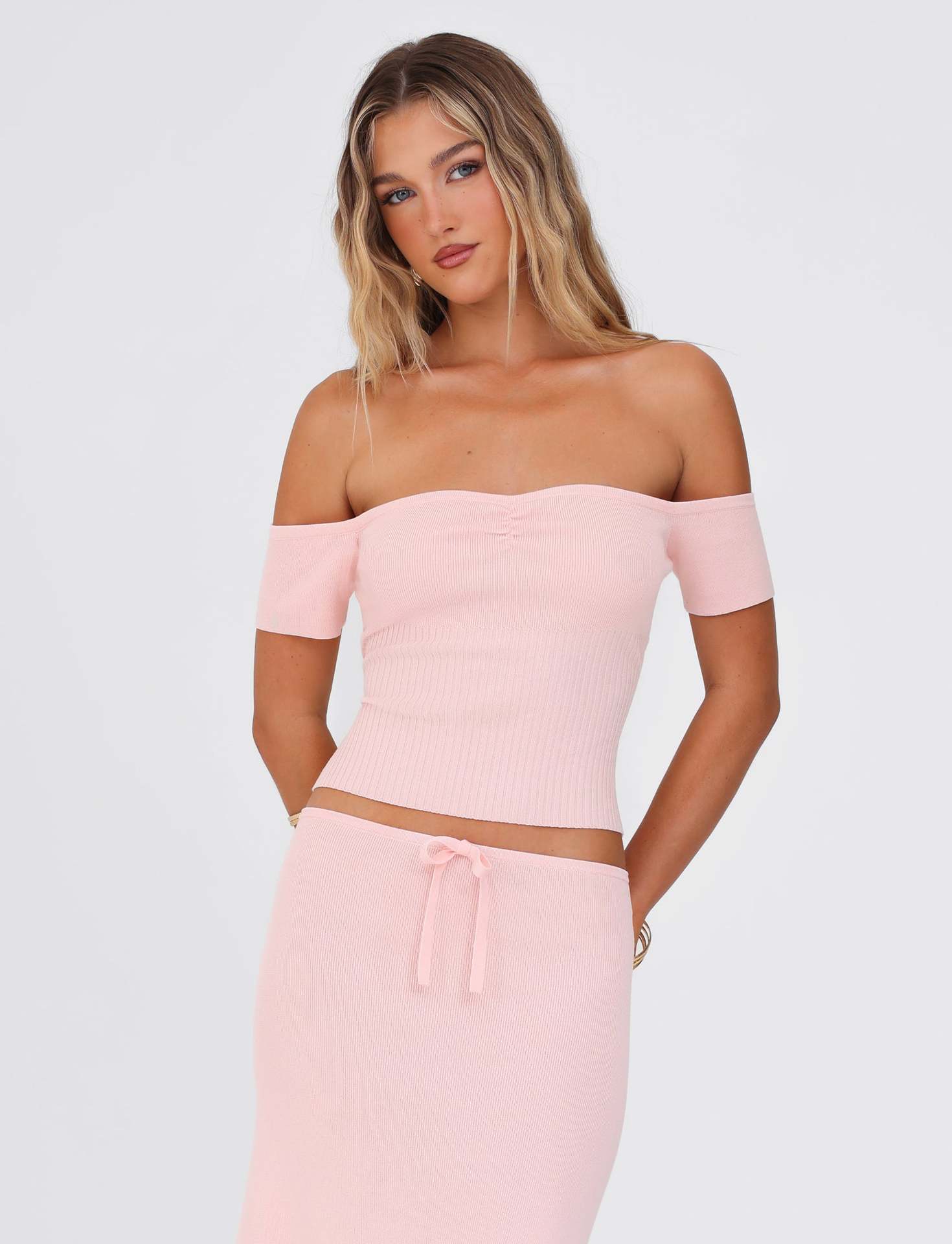 Rosa slim fit topp utan axlar