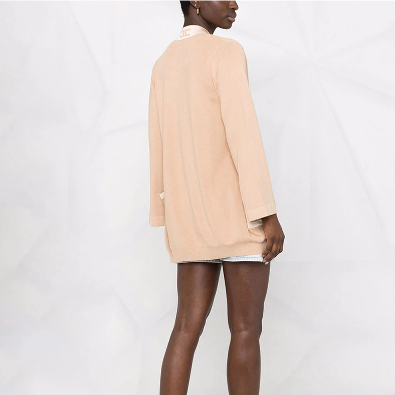 Badrock med bälte i midjan stickad drees coat