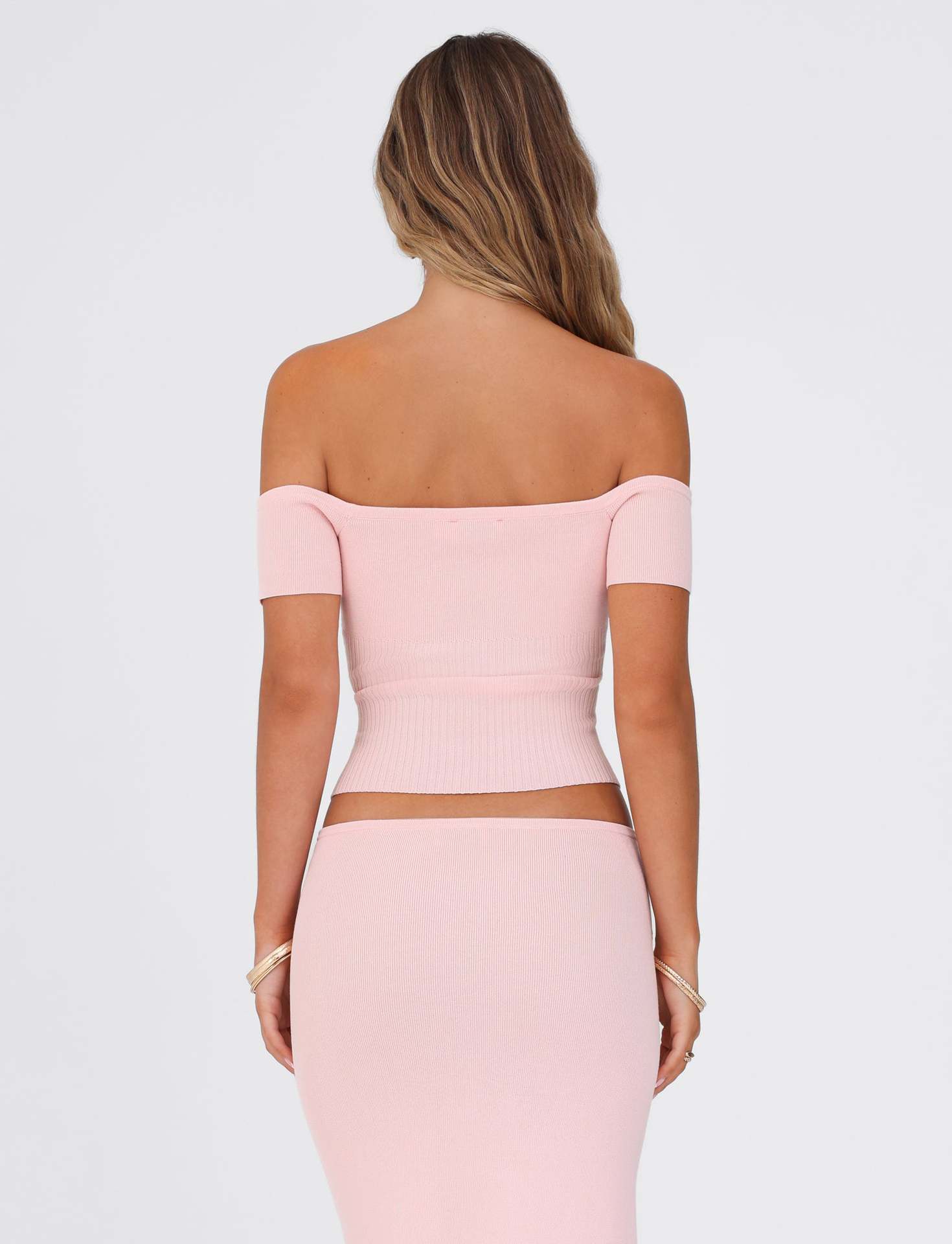 Rosa slim fit topp utan axlar