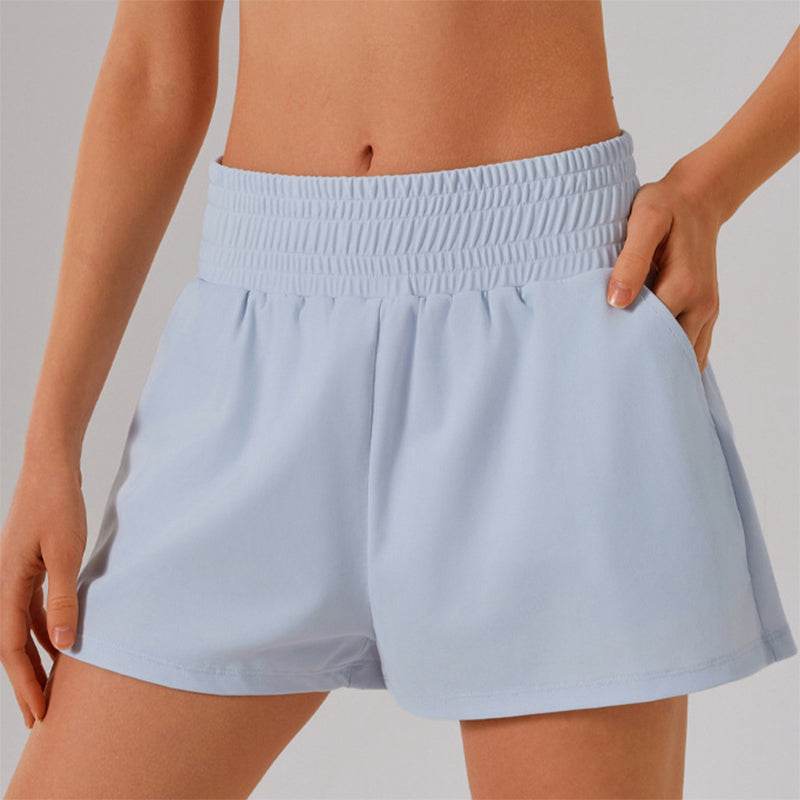 Högmidjade sportshorts med ficka