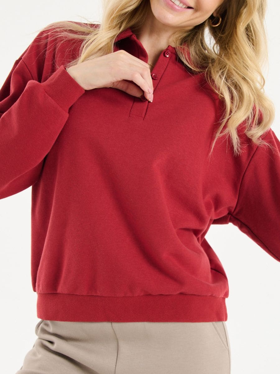 Blus med skjortkrage, knappar och nedsänkta axlar
