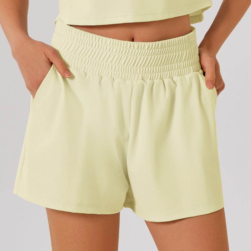 Högmidjade sportshorts med ficka