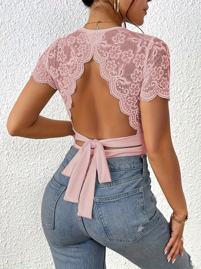 Randig jumpsuit med stickad bar rygg