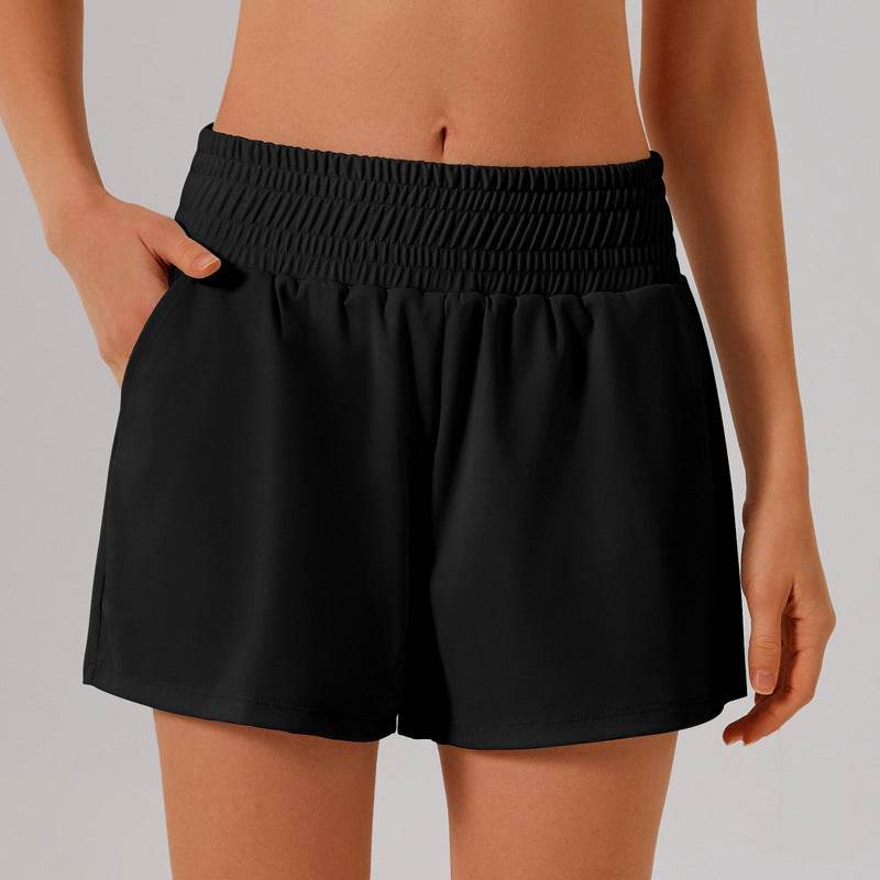 Högmidjade sportshorts med ficka