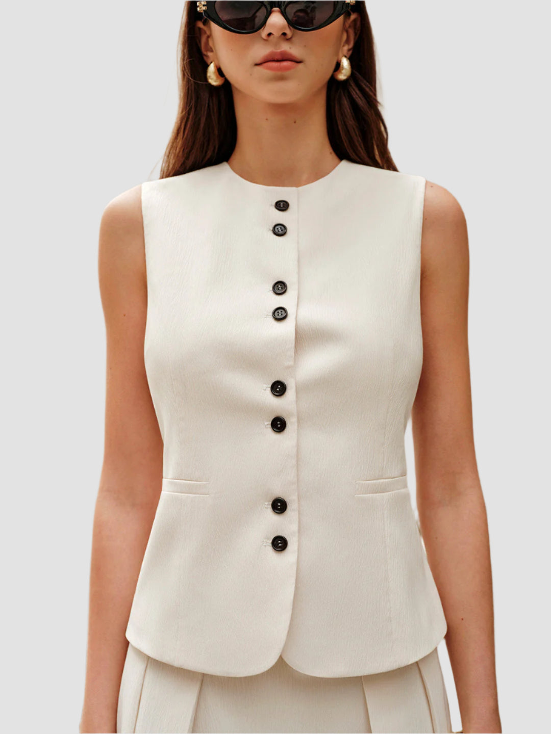 Elegant set med knäppt väst och minikjol