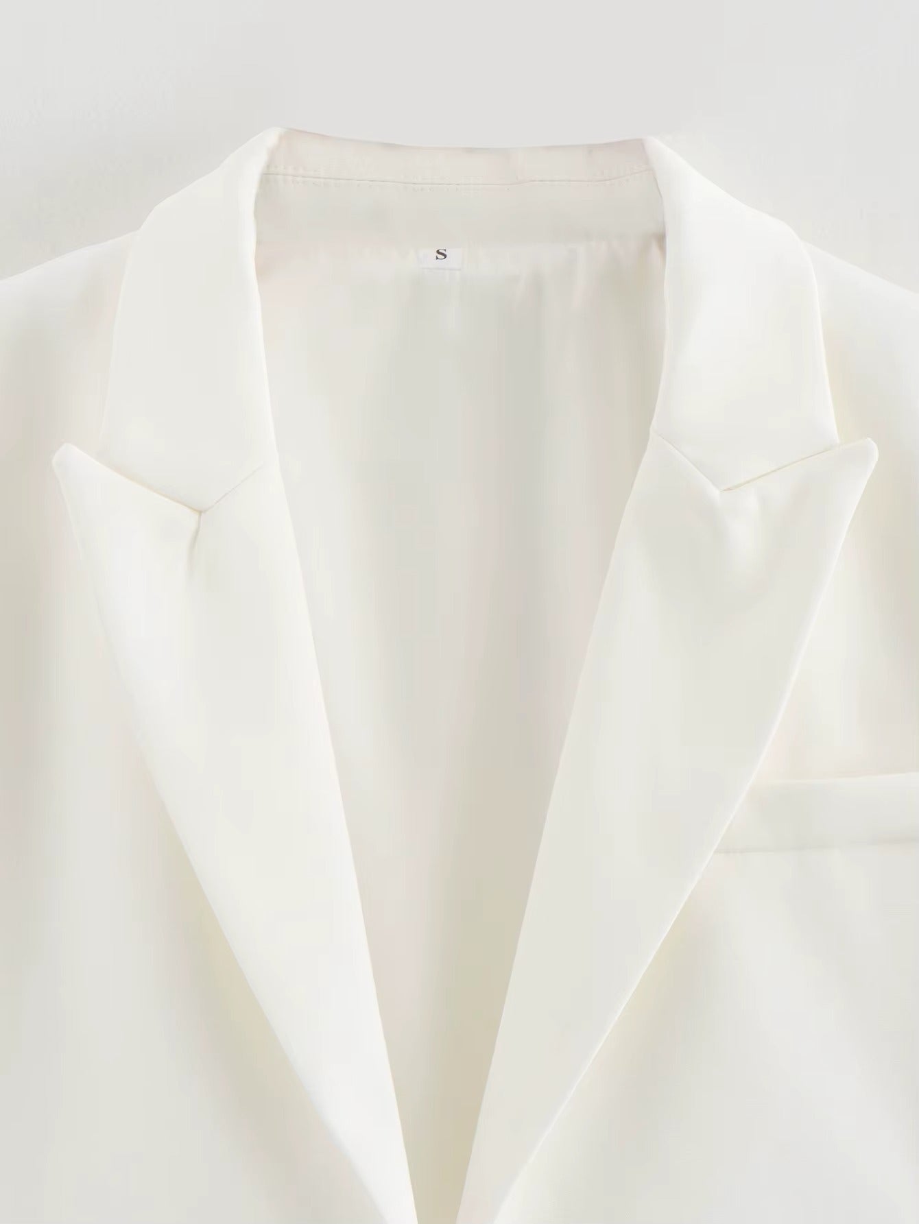 Kort elegant kappa med öppen front