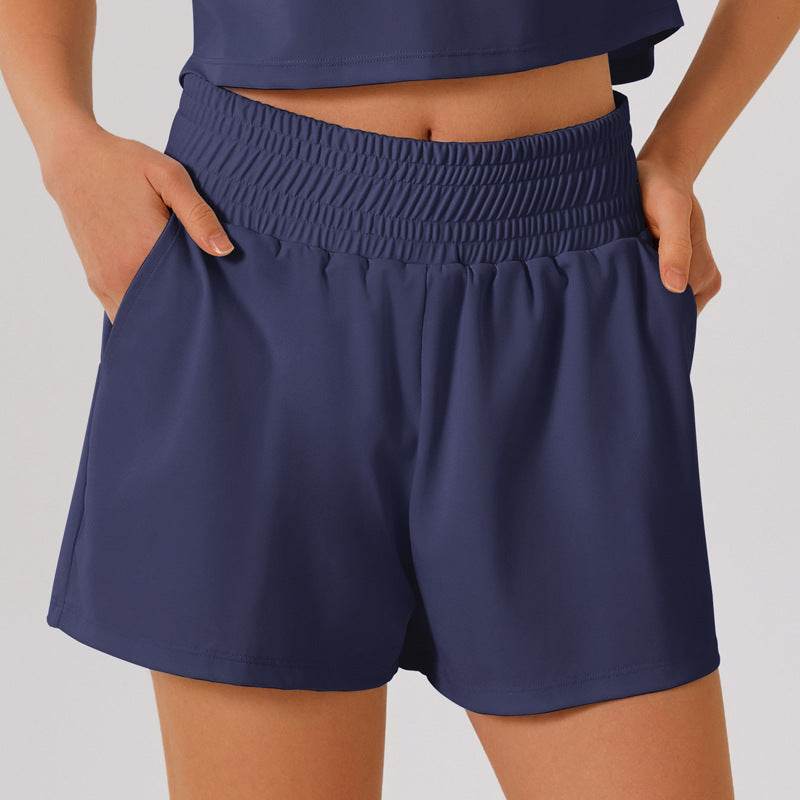 Högmidjade sportshorts med ficka