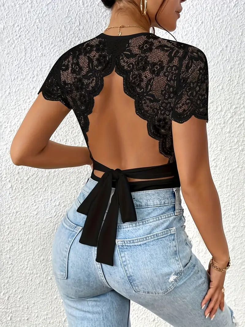 Randig jumpsuit med stickad bar rygg