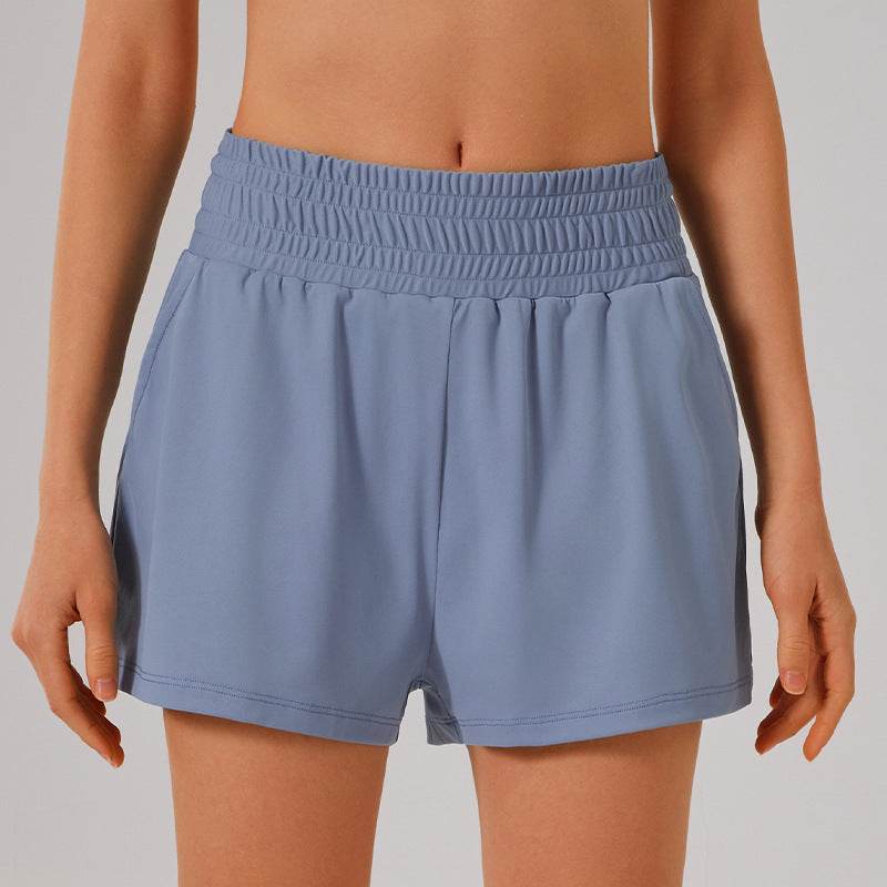 Högmidjade sportshorts med ficka