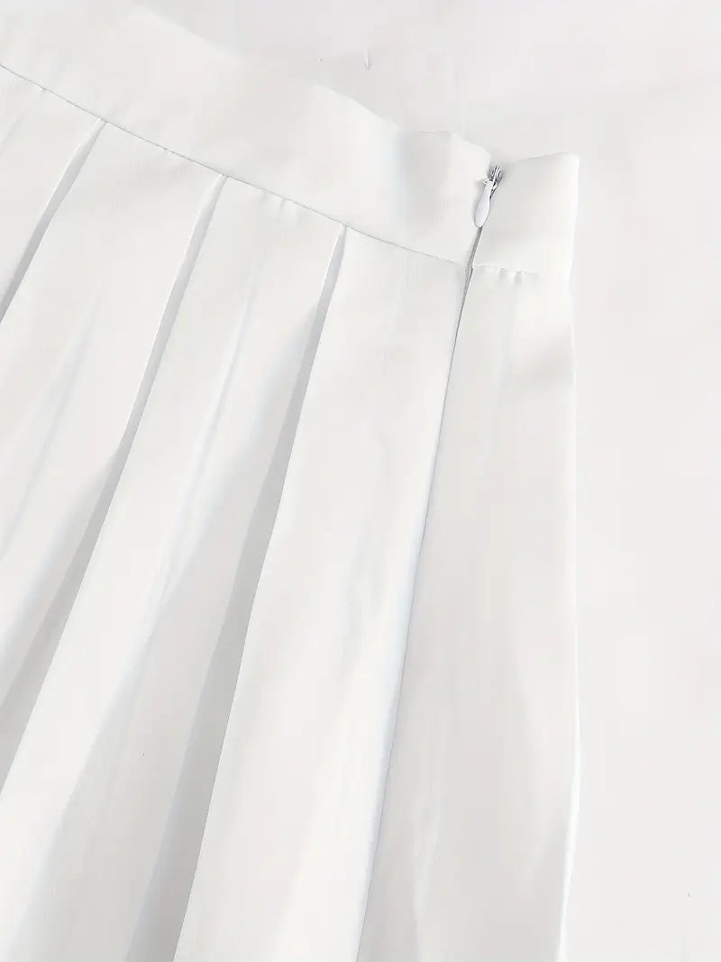 Elegant kostym med plisserad minikjol