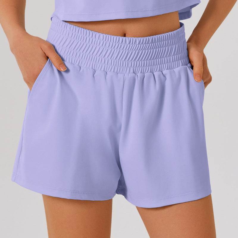 Högmidjade sportshorts med ficka