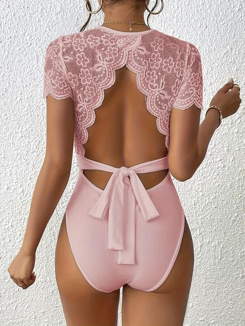 Randig jumpsuit med stickad bar rygg