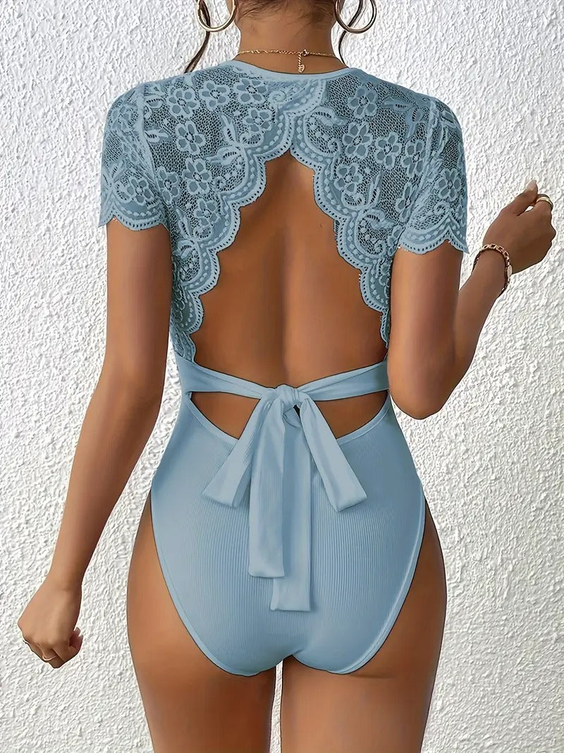 Randig jumpsuit med stickad bar rygg