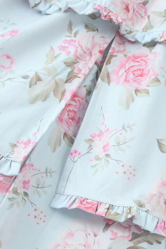 Vintageblommig midiklänning med V-ringning och volang