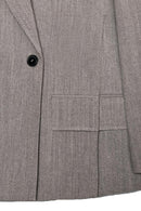 Grå jacka med slag och sidoslitsar