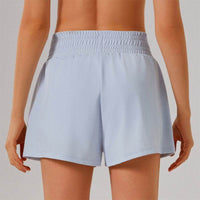 Högmidjade sportshorts med ficka