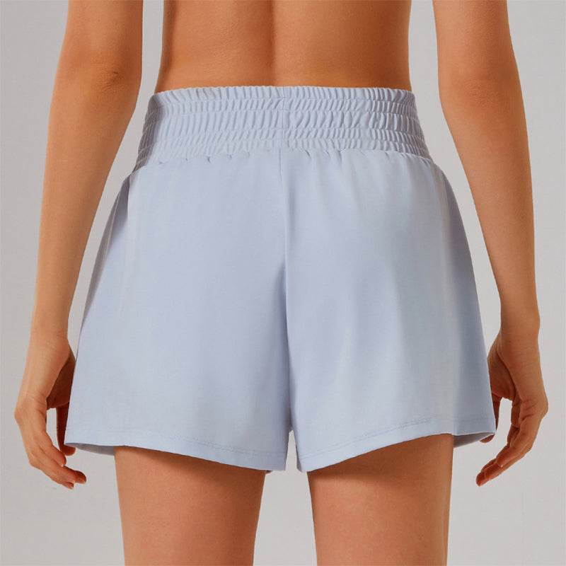 Högmidjade sportshorts med ficka