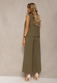 Grön tvådelad kostym, kortärmad jacka och utsvängda byxor