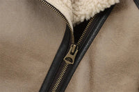 Andyas krämfärgad jacka med dubbel fåll, dragkedja fram och långa ärmar