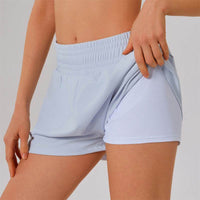 Högmidjade sportshorts med ficka