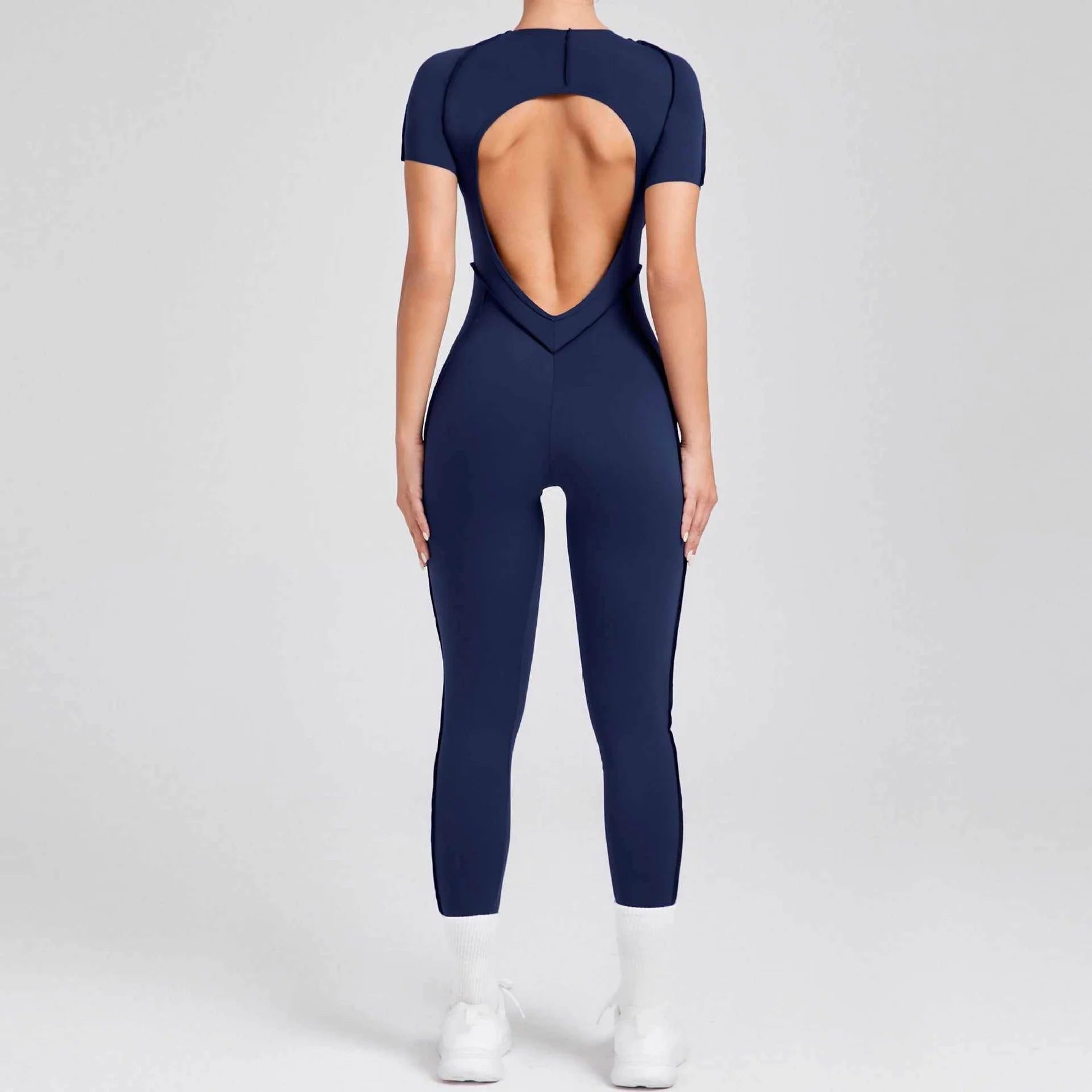 Kortärmade rygglösa sport jumpsuits