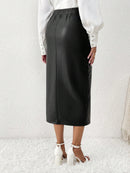 Jolie midi skirt in eco leather with slit on the side