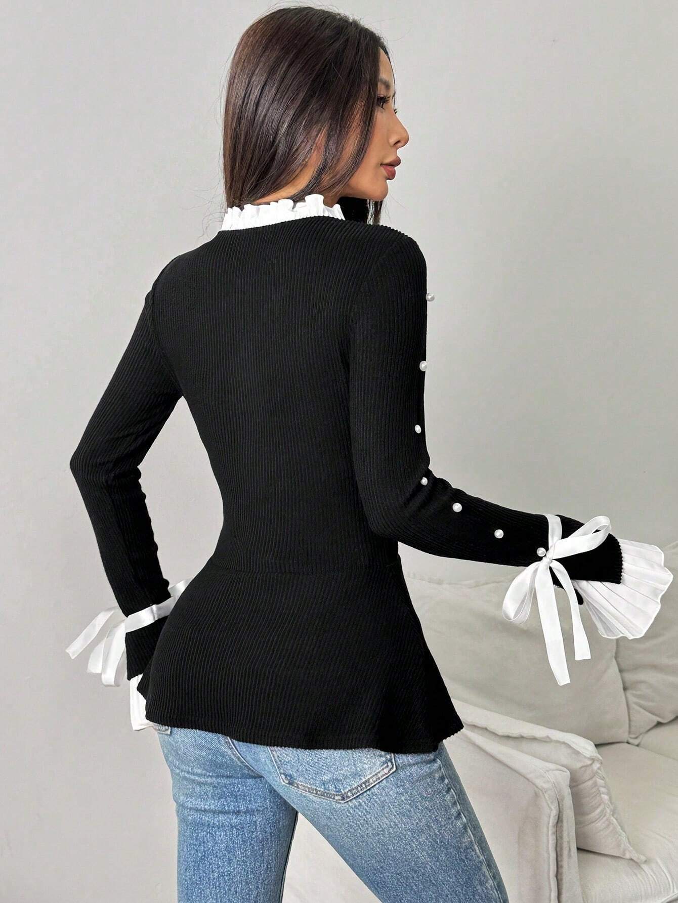 Långärmad blus med eleganta sömmar