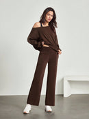 Izabell brun kostym med utsvängda byxor och en bar axel