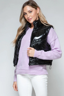 Turtleneck glänsande svart quiltad väst