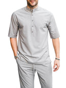 Grå skjorta med halva knappar och korta ärmar