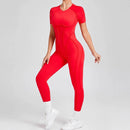 Kortärmade rygglösa sport jumpsuits