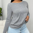 Grå långärmad t-shirt med rund krage och urringning baktill