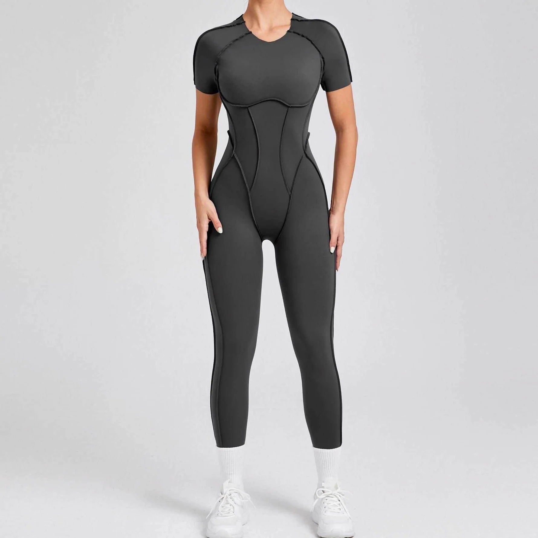 Kortärmade rygglösa sport jumpsuits