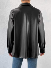 Tessa avslappnad svart enkelknäppt jacka