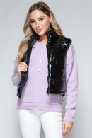 Turtleneck glänsande svart quiltad väst