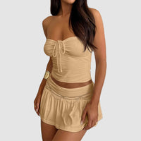 Tvådelat set med kort kjol och topp