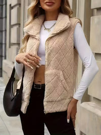 Ärmlös blus med dragkedja och hög krage