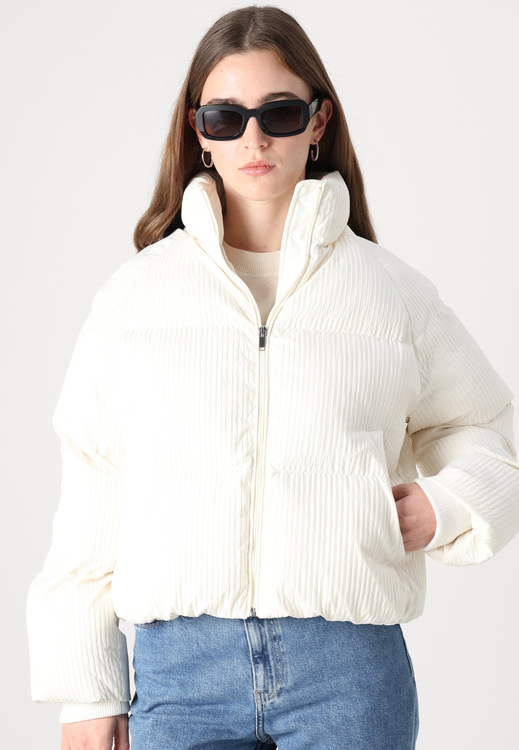 Vadderad jacka med textur