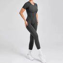 Kortärmade rygglösa sport jumpsuits
