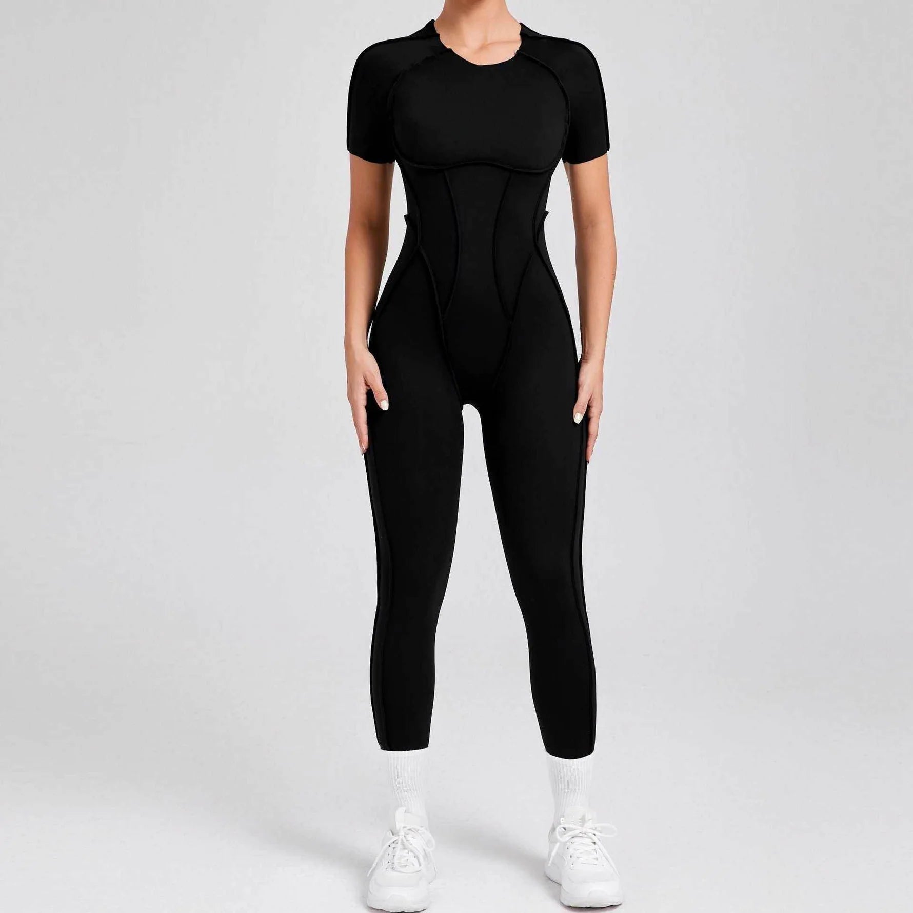 Kortärmade rygglösa sport jumpsuits