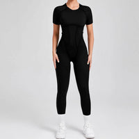 Kortärmade rygglösa sport jumpsuits
