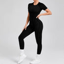 Kortärmade rygglösa sport jumpsuits