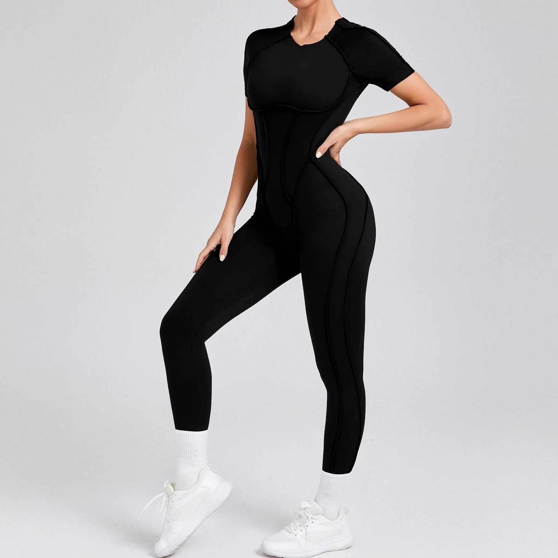 Kortärmade rygglösa sport jumpsuits