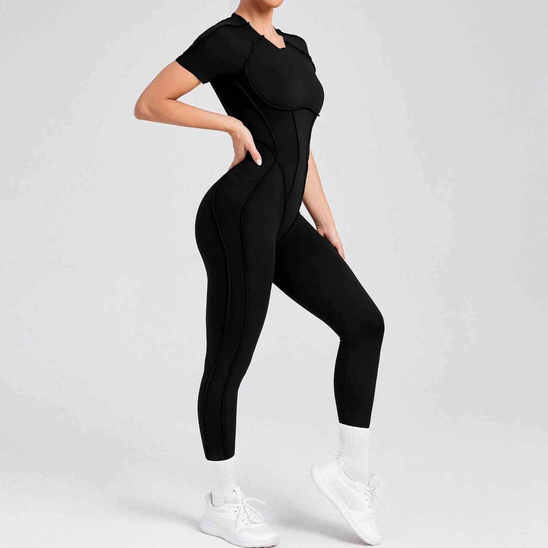 Kortärmade rygglösa sport jumpsuits