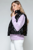 Turtleneck glänsande svart quiltad väst