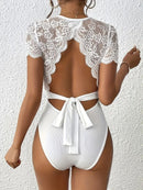 Randig jumpsuit med stickad bar rygg