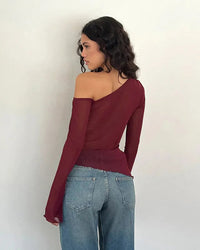 EMY-blus med bara axlar och långa ärmar